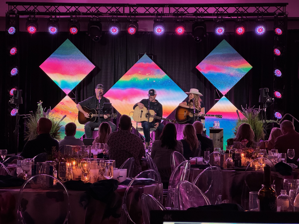 Clutch transformed the space for this Lubbock fundraiser concert with immersive lighting and custom LED visuals.